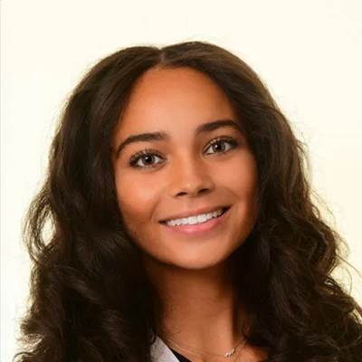 A headshot photo of Dr. Sydney Washington